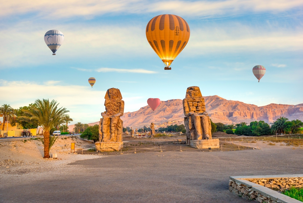 Hot,Air,Balloons,Over,Colossi,Of,Memnon,In,Luxor,,Egypt